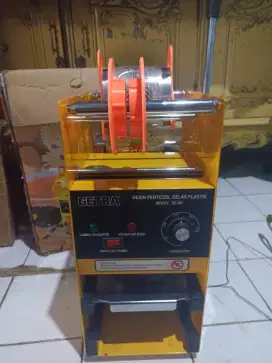 Mesin press minuman getra