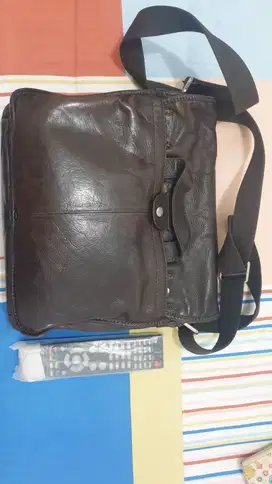 Tas kulit Fosil coklat tua