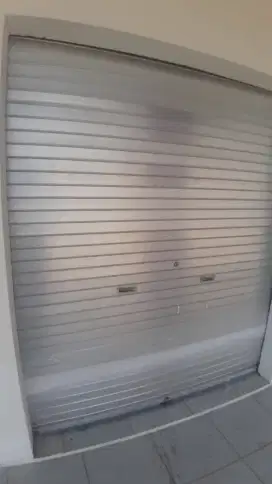 Folding gate rolling door