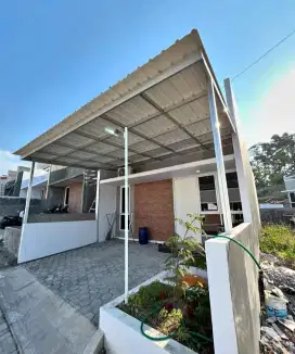 Renovasi dan atap bajaringan terpasang
