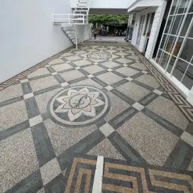 Lantai carpot batu sikat motif