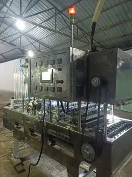Mesin filling cup