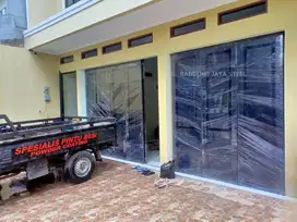 Pintu besi ruko sliding lipat , jasa pasang dan service bandung