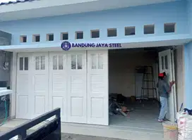 Pintu garasi henderson berkualitas, finishing powder coating