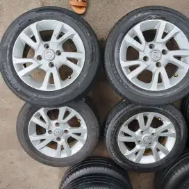 Velg original Nissan grand Livina ring 15 pcd 4x114,3 ban 185/65 R15