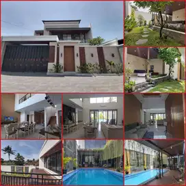 Rumah mewah dengan tanah luas dan kolam renang gito gati
