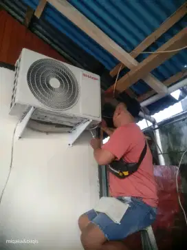 SERVICE AC BONGKAR PASANG AC