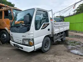 Isuzu NHR engkel 4 roda bak besi cargo tahun  2011 power stering