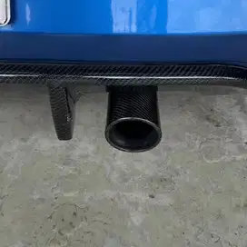 Exhaust tip carbon