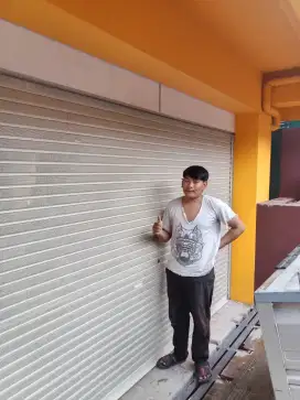 Folding gate rolling door