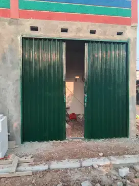 Folding gate rolling door