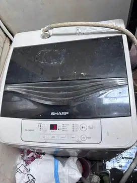 Sharp mesin cuci bukaan atas