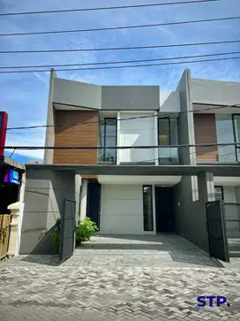 Rumah mewah Raya Kutisari Indah modern minimalis hadap utara