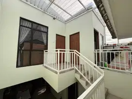 Rumah east portofino villagio citra raya