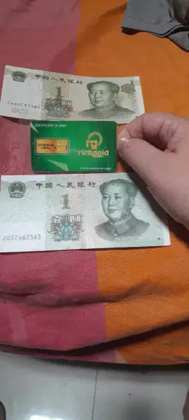 Logam mulia 0.0005 g hadiah dua lembar uang china satu yuan