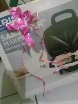 Pemanggang roti merk kris