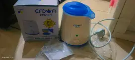 Crown bottle warmer