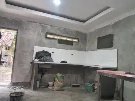 Tukang bangunan dan tenaga.langsung tukang bukan mandor.