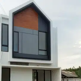 Rumah dua lantai di  tengah kota  makassar