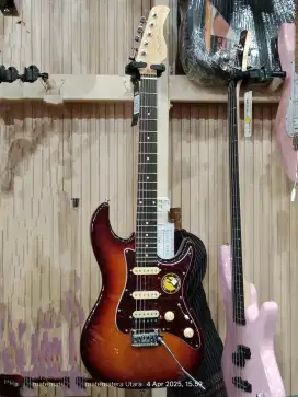Alat musik gitar elktrik dan akustik