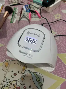 Alat pengering kutek,tas make up berserta seperangkat kutek dan kukuan