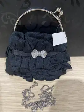 Tas pesta hitam