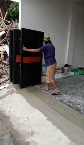 pintu lipat perforated motif kayu kupu kupu
