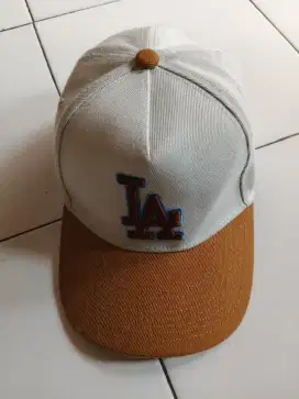 TOPI LA TAG NEW ERA