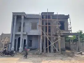 rumah di tengah kota