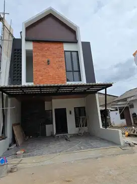Rumah cluster 4 menit gerbang tol dan  Stasiun LRT