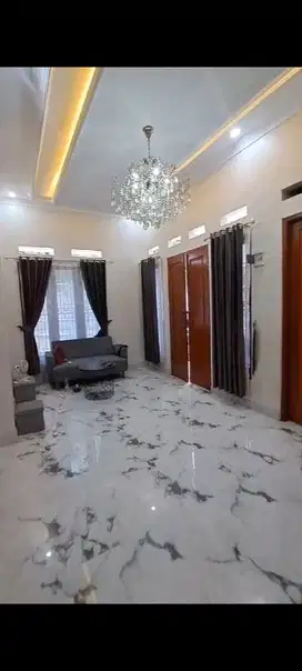 Rumah baru dan mewah dalam cluster pinggir jalan raya kalimulya Depok.