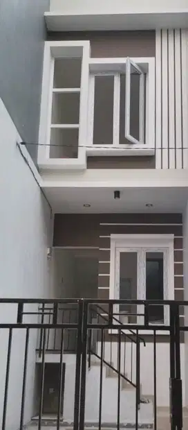 Rumah 2lt 4,5x10 45m type 2KT Komplek Bea Cukai Sukapura Jakarta Utara
