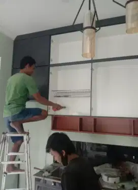 Tukang batu dan tukang kayu