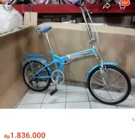 Sepeda United type sepeda lipat dengan boncengan belakang