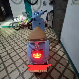 Motor vespa pakaian pribadi