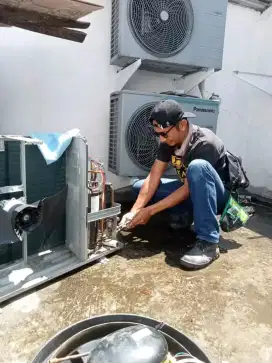 SERVICE AC BONGKAR PASANG AC