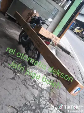 Rel otomatis dekson
