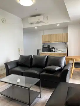Apartemen 2BR Luas 65 m², Orange County Lippo Cikarang, 130 Juta/Tahun