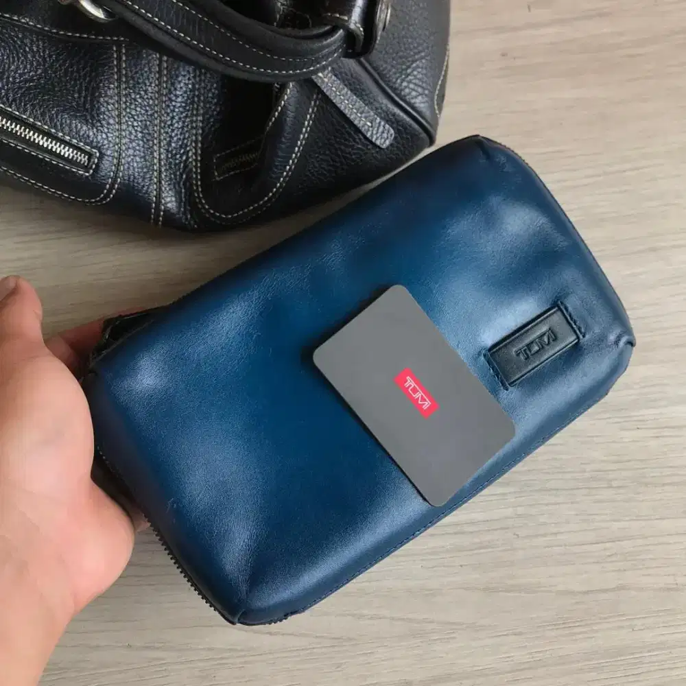 Tumi nassau triple zip clutch leather blue burnished