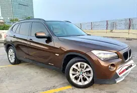 BMW X1 SDrive 18i Tahun 2012 Automatic Coklat metalik KM 40rb Service