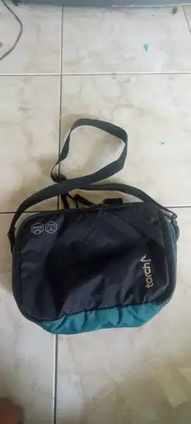 Tas torch selempang