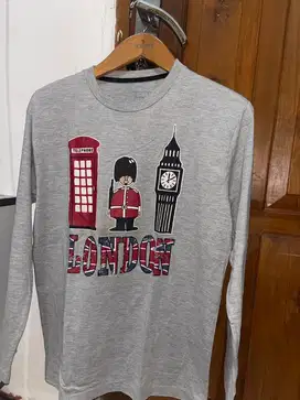 Kaos gambar merk Tzone