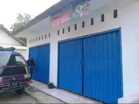 Folding gate rooling door