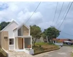 Rumah strategis pinggir jalan siap huni