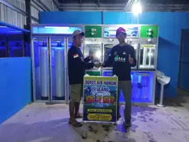 Pemasangan depot air isi ulang galon