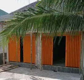 Folding gate rooling door