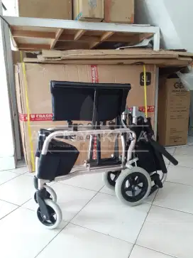 Kursi roda travelling bekas
