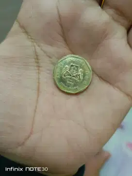 Uang koin satu dollar Singapore langka