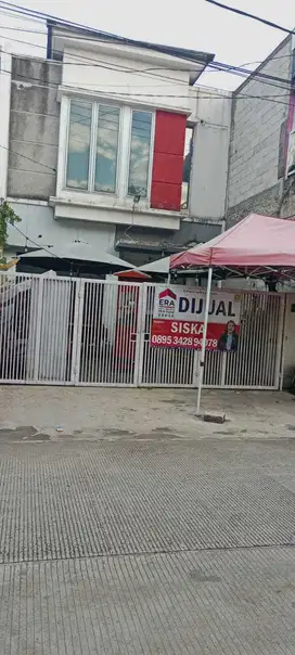 Dijual murah rumah 2 lt dipinggir jl boulevard sebelah alun alun depok