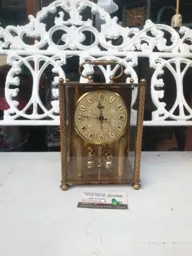 Vintage Comma commemorative clock from Germany made of gold plated